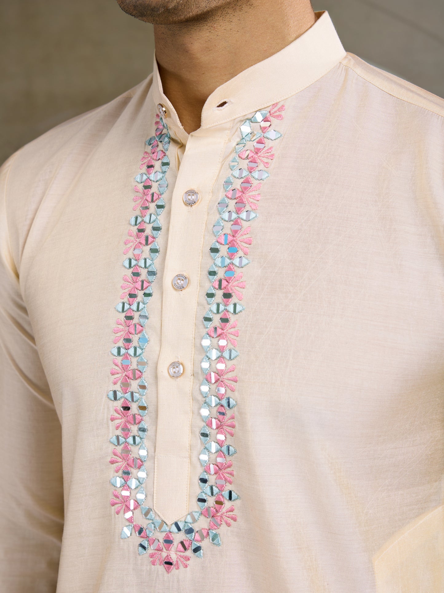 Elegant Cream Kurta with Pastel Pink Nehru Jacket & Mirror Work Detailing