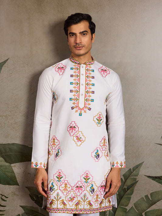 White Kurta with Multicolor Tribal Embroidery & Heritage Motifs