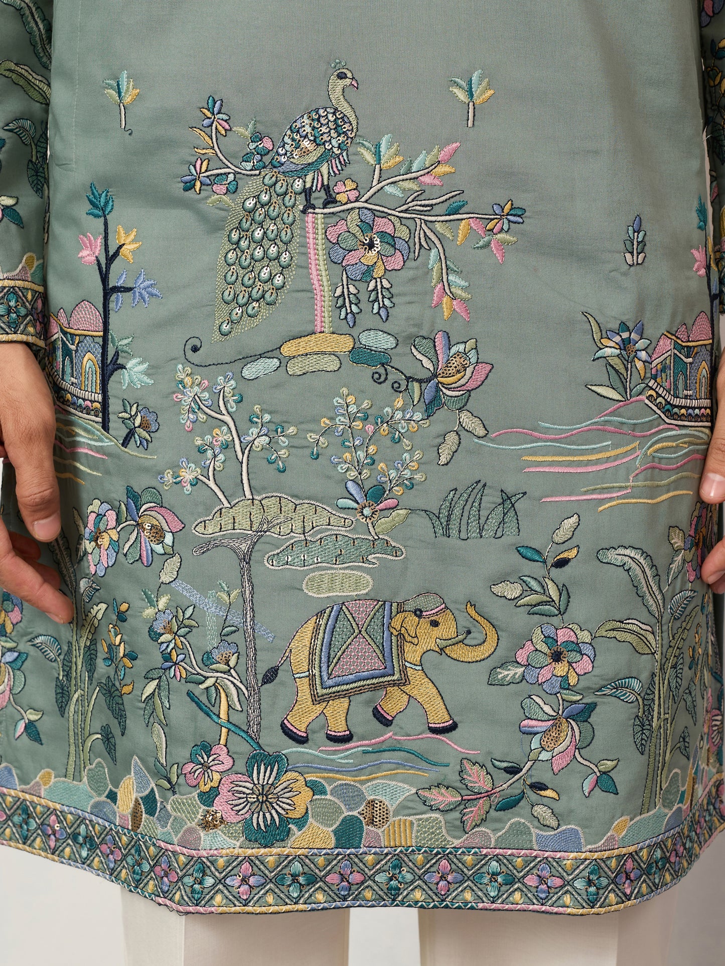 Pista Embroidered Kurta with Peacock & Elephant Motif