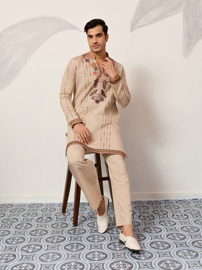 Classic Beige Embroidered Kurta Set with Signature Floral & Bird Artistry