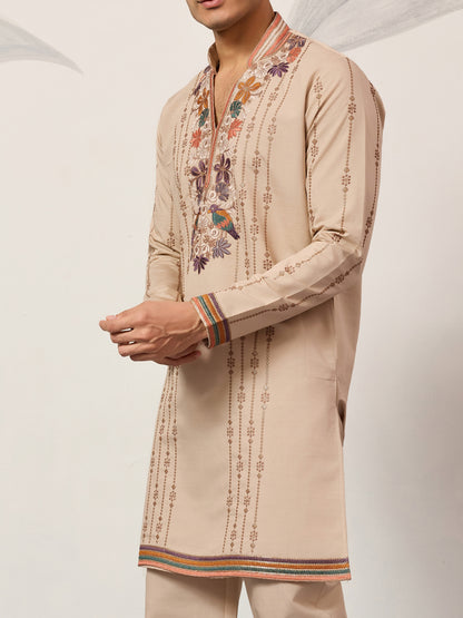 Classic Beige Embroidered Kurta Set with Signature Floral & Bird Artistry