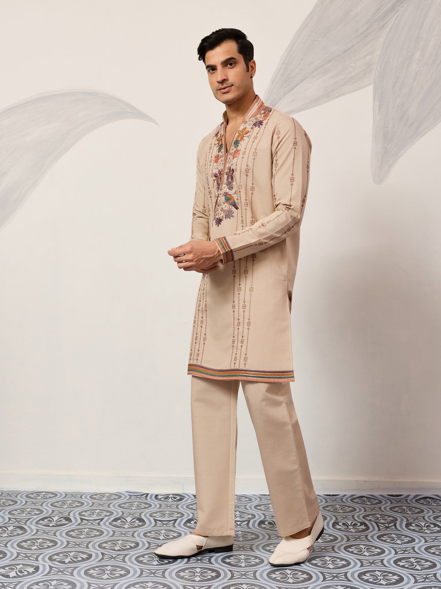 Classic Beige Embroidered Kurta Set with Signature Floral & Bird Artistry
