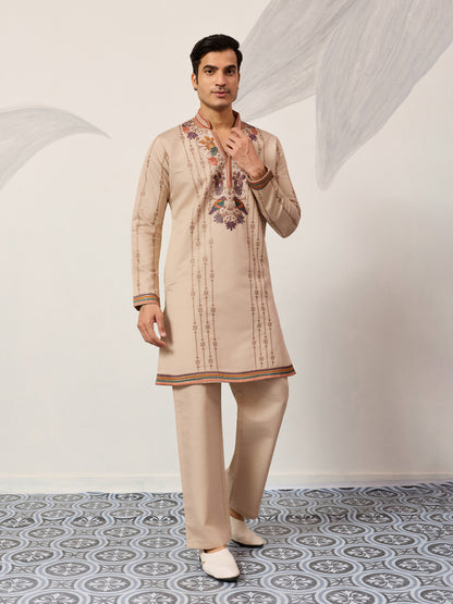 Classic Beige Embroidered Kurta Set with Signature Floral & Bird Artistry