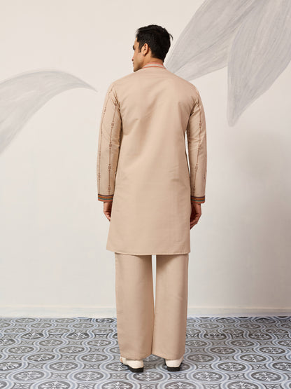 Classic Beige Embroidered Kurta Set with Signature Floral & Bird Artistry